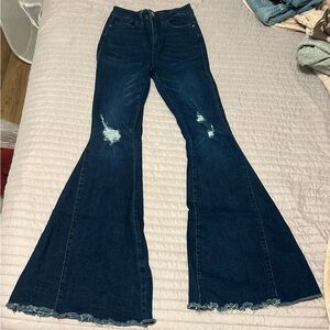 Stylish Dark Blue Flare Jeans with Distressed Details